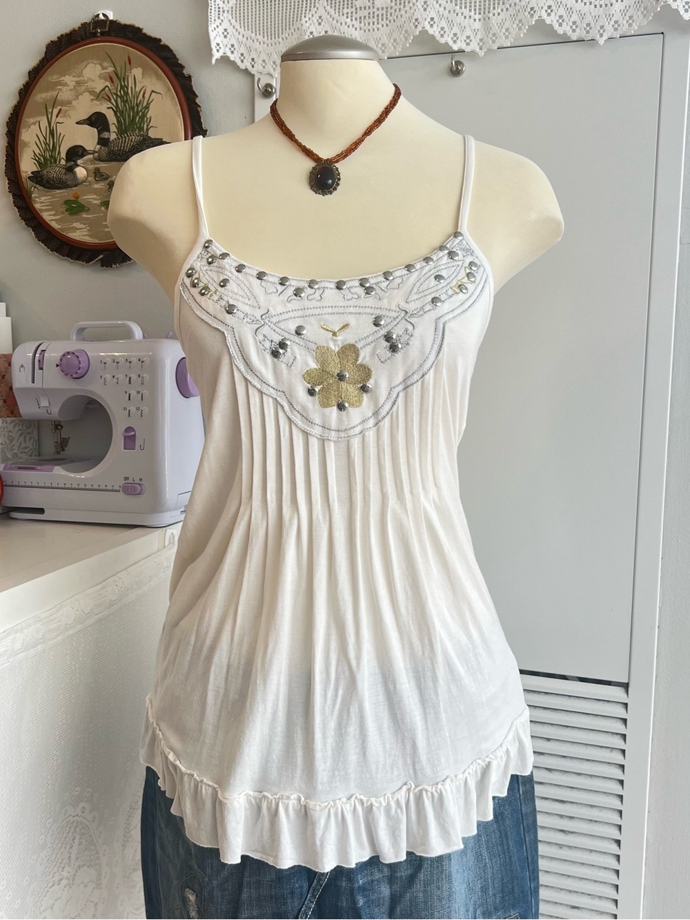 Y2K white cami top with embroidered floral design and studded details